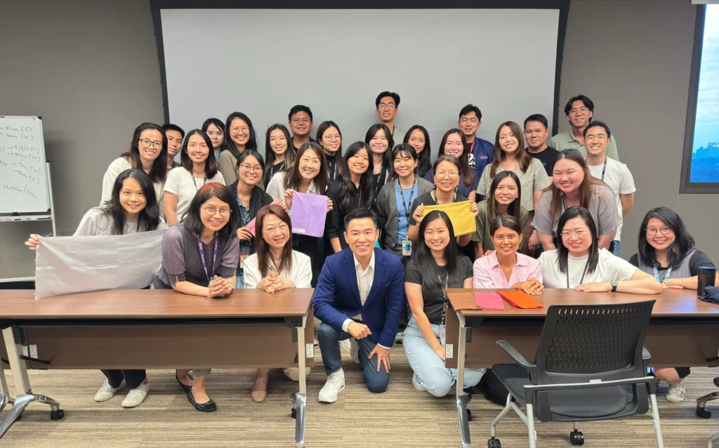 Lionel Lim with Illumina employees after a colour analysis workshop